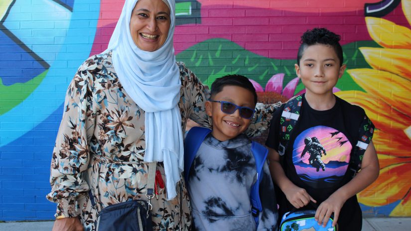 students are posing with their teacher