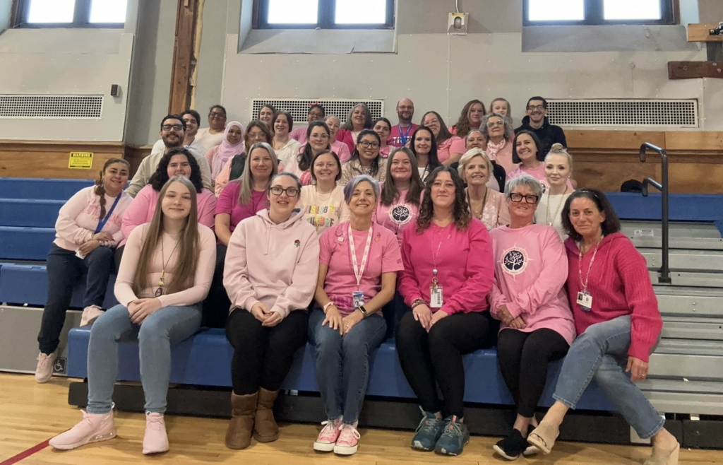 staff members dressed in pink for ride to survive