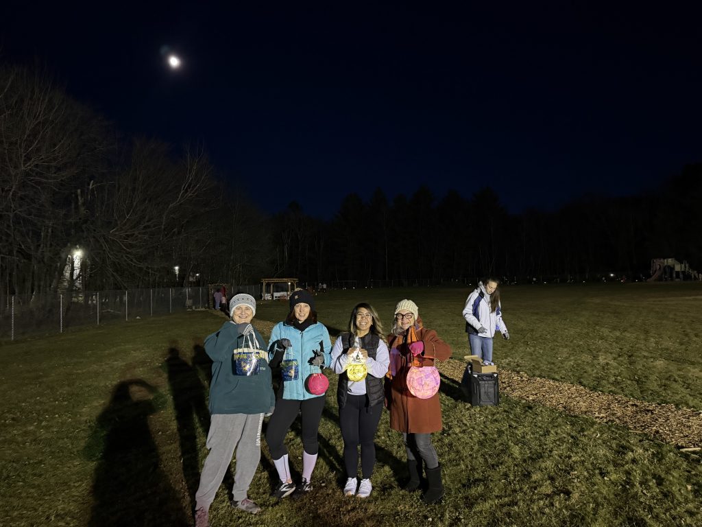 students and staff pose during the event