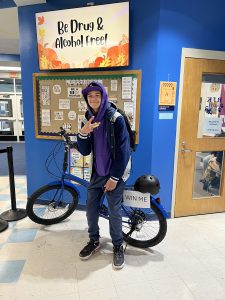 Julian Reyes poses with bike