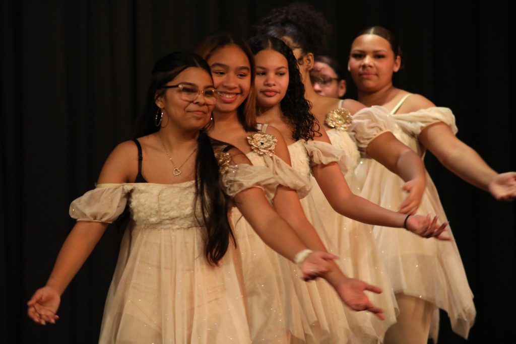 a line of ballerinas on stage during the nutcracker