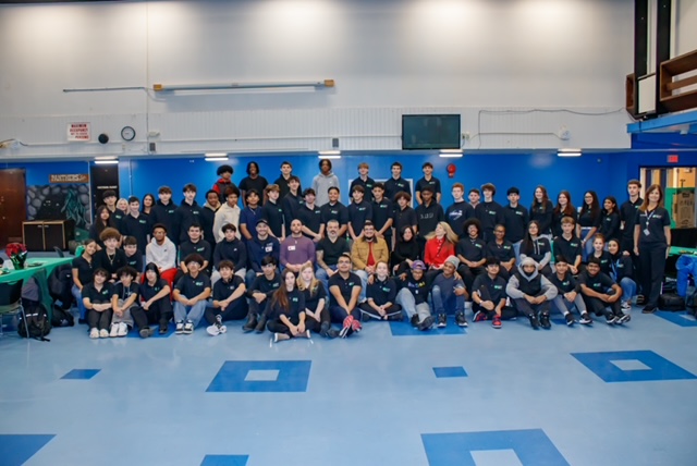 the aof students and mentors pose during breakfast 